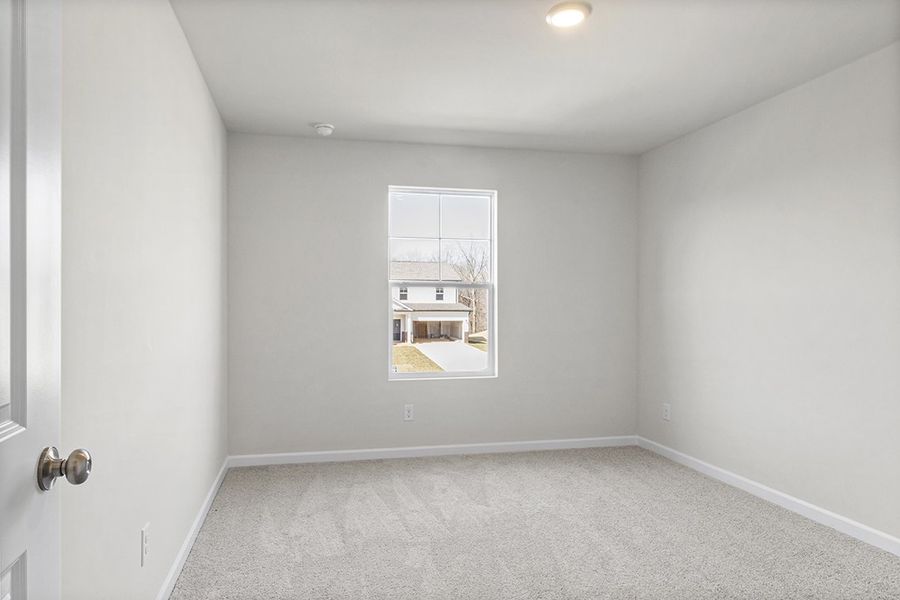 A room with a window. A room with a window.