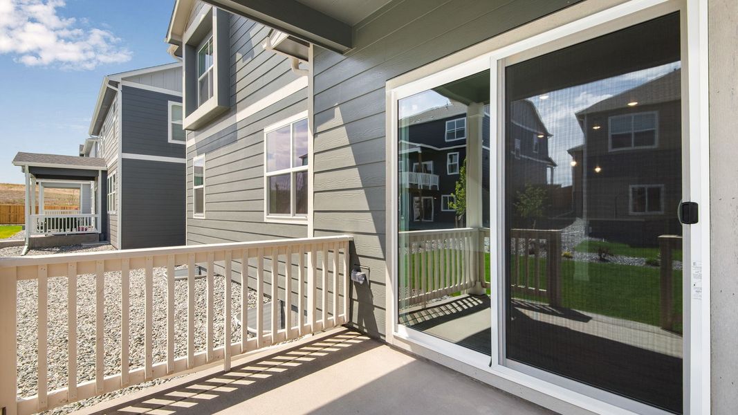 Exterior details and patio area of a home in Trails at Crowfoot, Parker (Image 26).