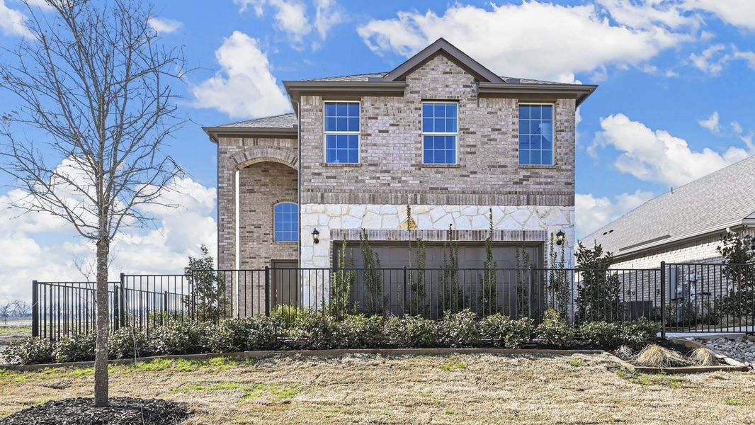 Front exterior of a new home in Bel Air Village, Sherman, TX, highlighting curb appeal (Image 1). Front exterior of a new home in Bel Air Village, Sherman, TX, highlighting curb appeal (Image 1).