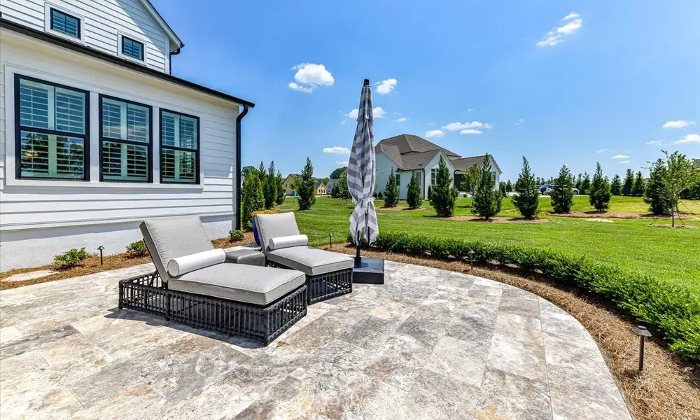 Exterior details and patio area of a home in Stephens Farm, Huntersville (Image 4). Exterior details and patio area of a home in Stephens Farm, Huntersville (Image 4).