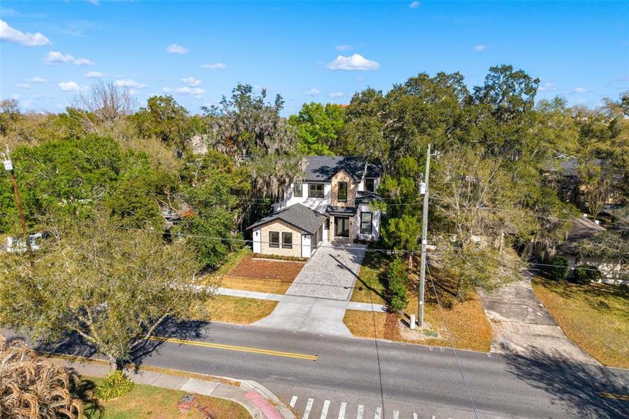 Front exterior of a new home in , Winter Park, FL, highlighting curb appeal (Image 27).