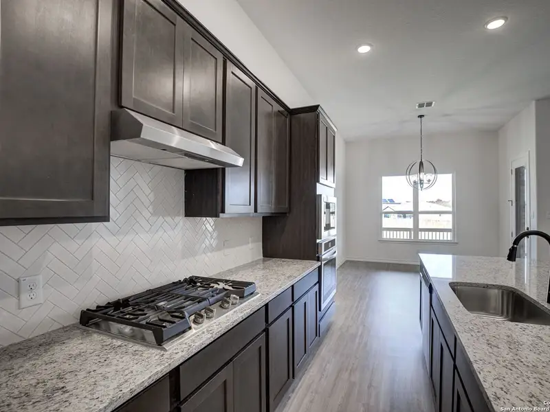 Furnished interior view inside a new home in The Reserve at Potranco Oaks, Castroville (Image 10).