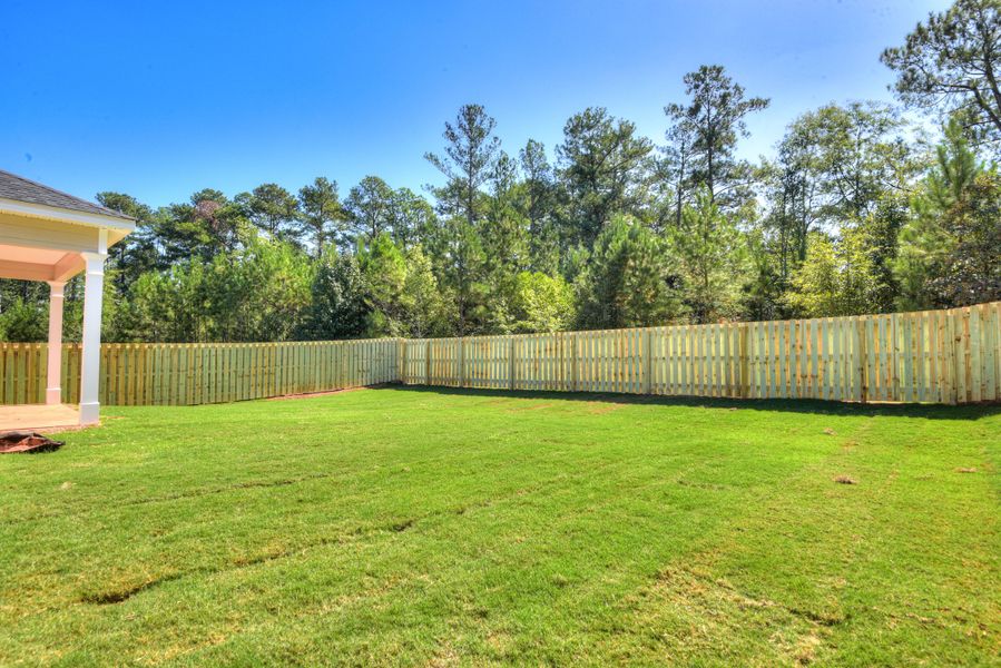 Exterior details and patio area of a home in The Sanctuary, Aiken (Image 18).