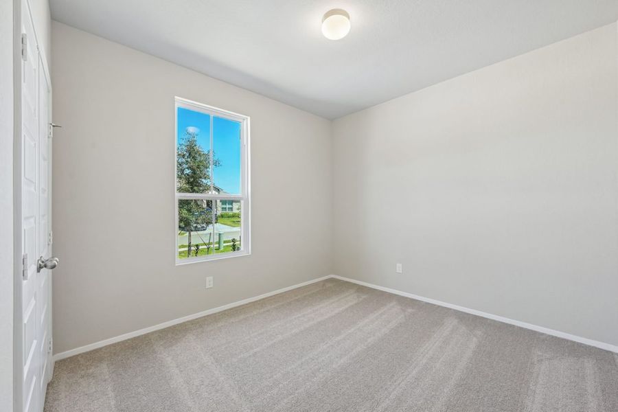 Spacious, unfurnished interior of a new home in Harrington Trails, New Caney (Image 24).
