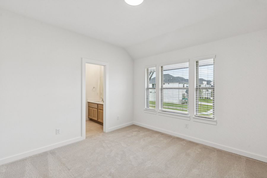 Bedroom in the Da Vinci II home plan by Trophy Signature Homes – REPRESENTATIVE PHOTO