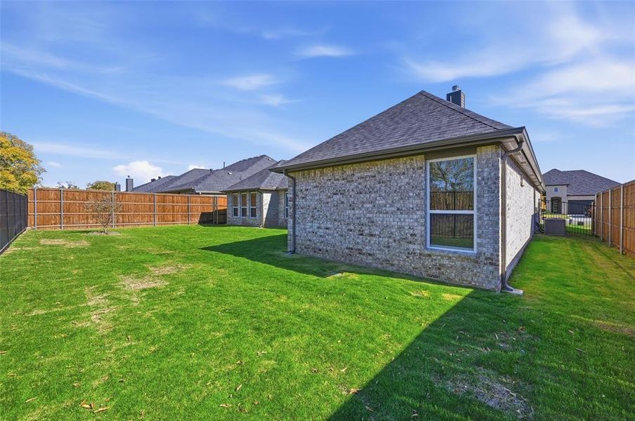 Exterior details and patio area of a home in LeTara, Haslet (Image 3).