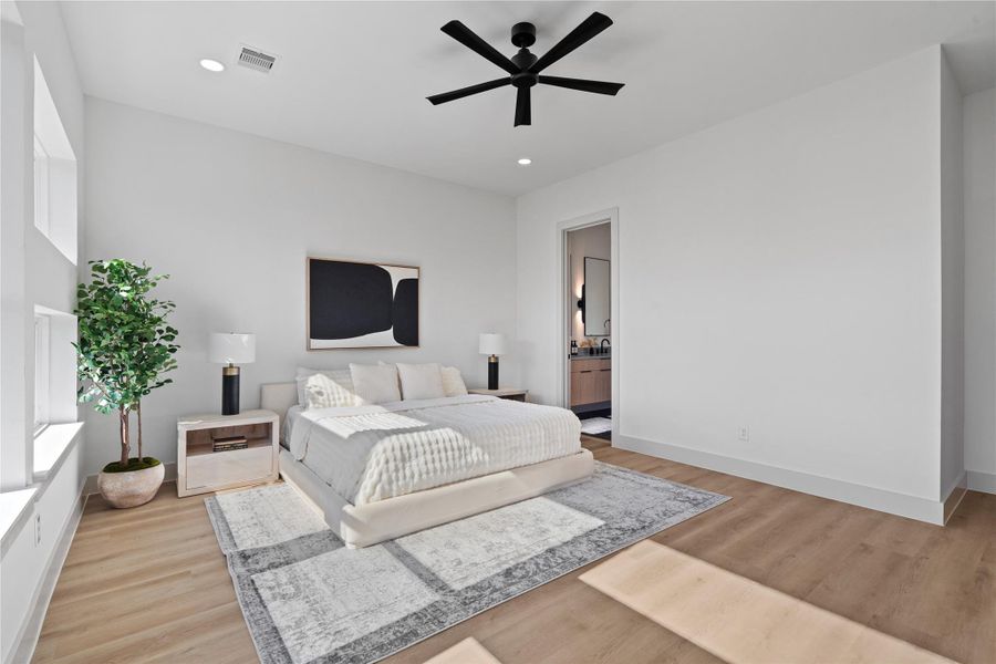 A generous 17×17 primary suite, defined by warm tones & an airy sense of scale rarely found in new construction. A generous 17×17 primary suite, defined by warm tones & an airy sense of scale rarely found in new construction.