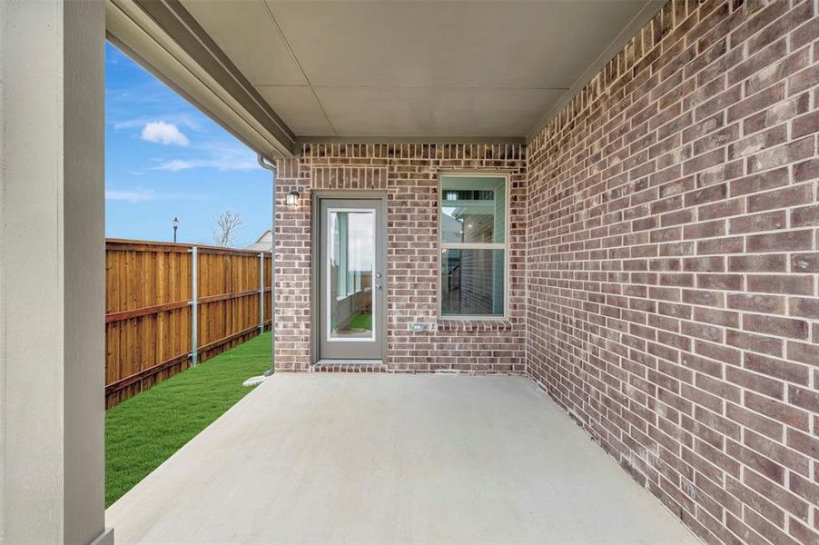 Exterior details and patio area of a home in Lilybrooke at Legacy Hills, Celina (Image 19).