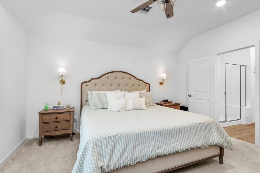 Primary bedroom with ensuite bathroom
