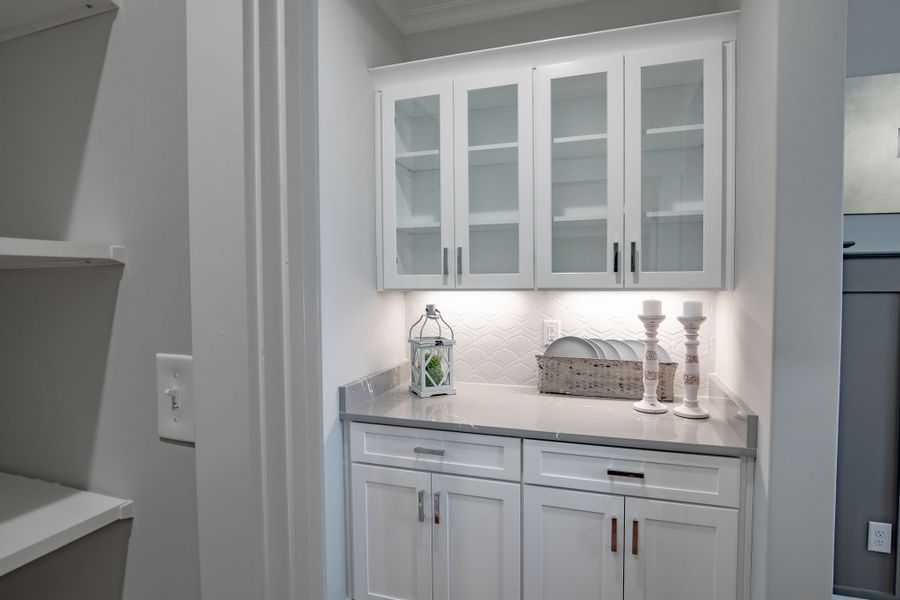 Representative furnished interior of a home built from the Willow by Grant & Co in Manor at Hall Creek, Arlington (Image 13).