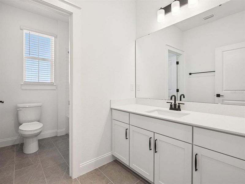 Furnished interior view inside a new home in Osprey Ranch, Winter Garden (Image 10).