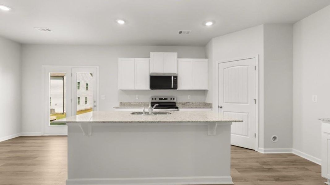 Furnished interior view inside a new home in Rolling Meadows, Jasper (Image 8). Furnished interior view inside a new home in Rolling Meadows, Jasper (Image 8).
