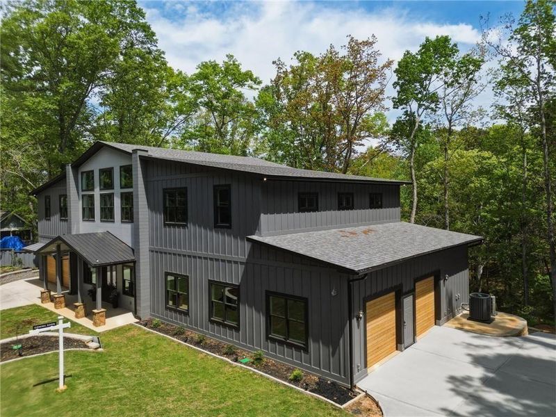 Front exterior of a new home in , Acworth, GA, highlighting curb appeal (Image 32).