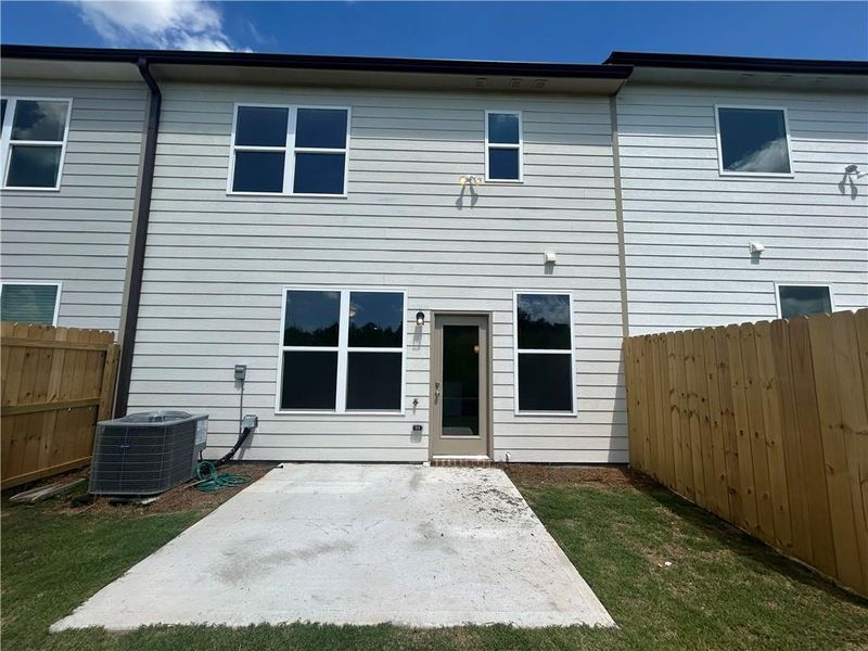 Exterior details and patio area of a home in Somerset at Riverbrook, Gainesville (Image 3).