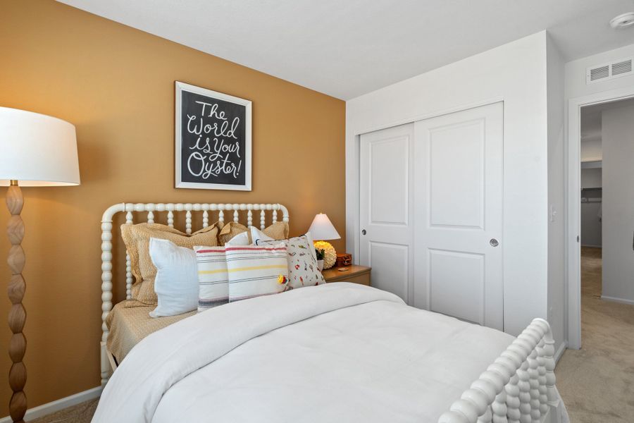 Representative furnished interior of a home built from the 2002 by Risewell Homes in Harvest Crossing, Aurora (Image 6).
