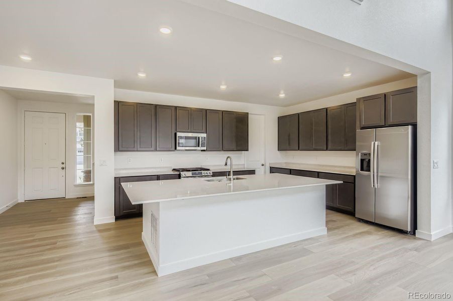 Furnished interior view inside a new home in Riano Ridge: The Grand Collection, Loveland (Image 7). Furnished interior view inside a new home in Riano Ridge: The Grand Collection, Loveland (Image 7).