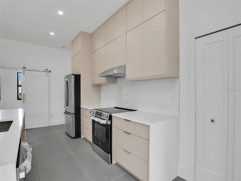 Furnished interior view inside a new home in , Port Charlotte (Image 14).