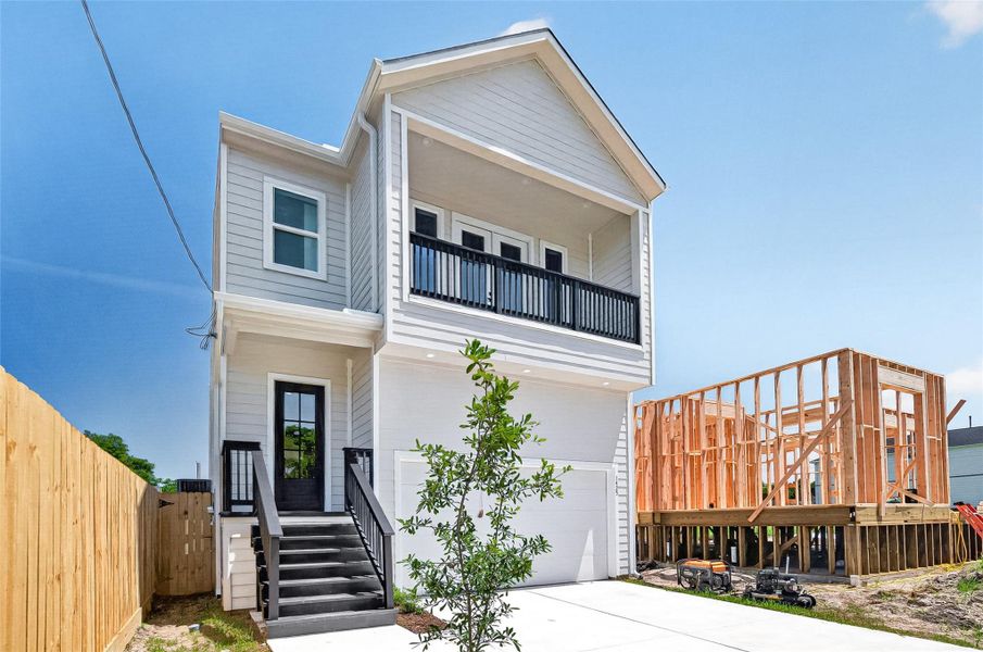Front exterior of a new home in , Houston, TX, highlighting curb appeal (Image 23). Front exterior of a new home in , Houston, TX, highlighting curb appeal (Image 23).