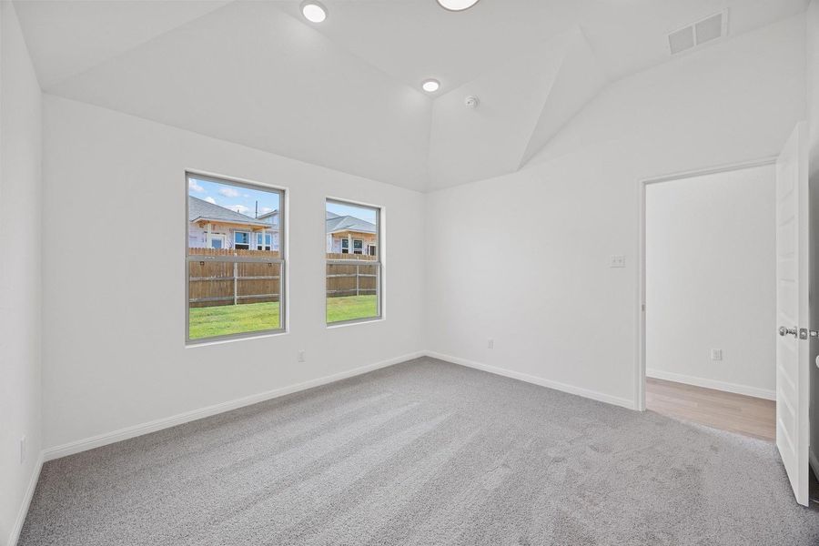 Primary Bedroom in the Cypress home plan by Trophy Signature Homes – REPRESENTATIVE PHOTO