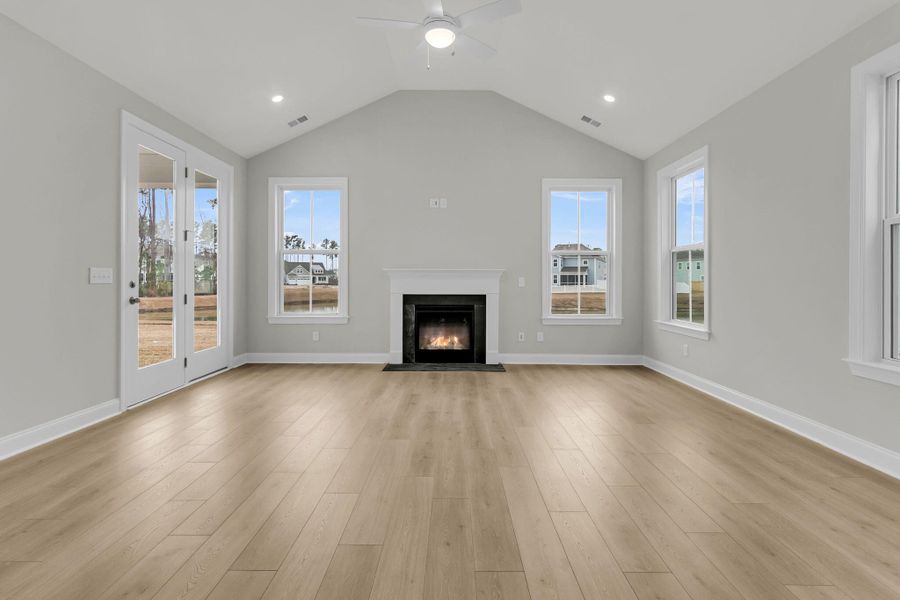 Spacious, unfurnished interior of a new home in Tidewater at Lakes of Cane Bay, Summerville (Image 22).