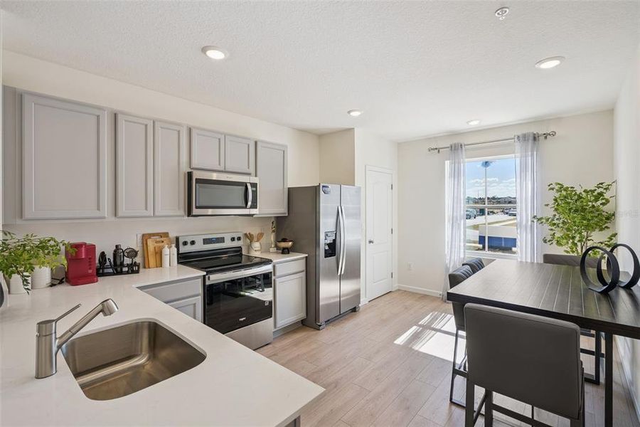 Furnished interior view inside a new home in Oak Pointe, Apopka (Image 27).