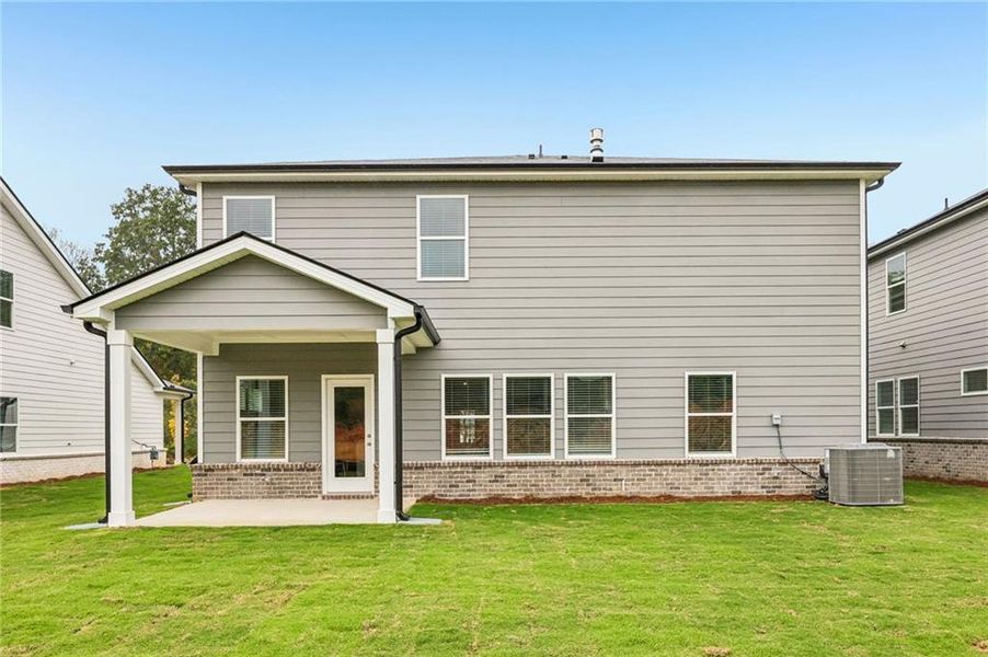 Exterior details and patio area of a home in Westmont Preserve, Powder Springs (Image 31).
