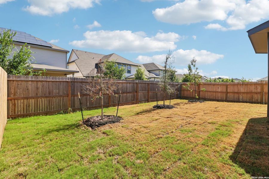 Exterior details and patio area of a home in Estancia Ranch - Premier Series, San Antonio (Image 27).