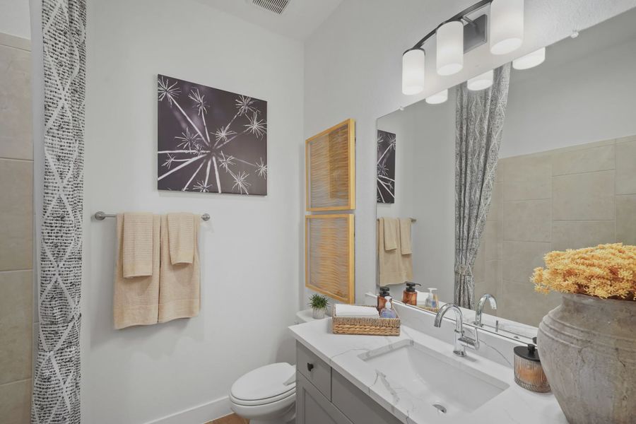 Representative furnished interior of a home built from the Silas by Chesmar Homes in Gregg Ranch, Marble Falls (Image 15).