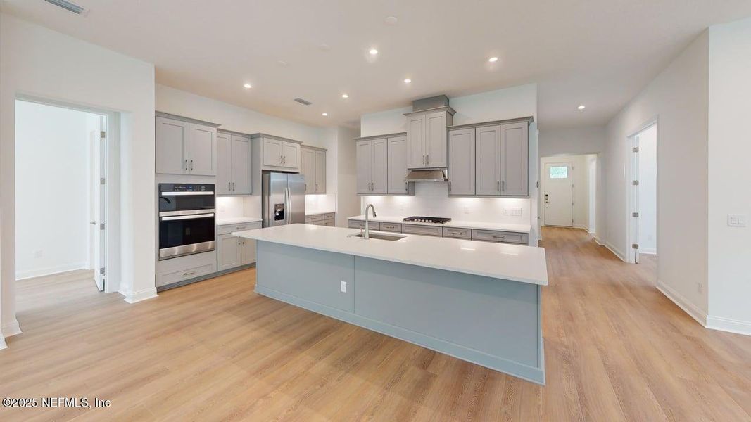 Furnished interior view inside a new home in RiverTown - WaterSong, St. Johns (Image 6).