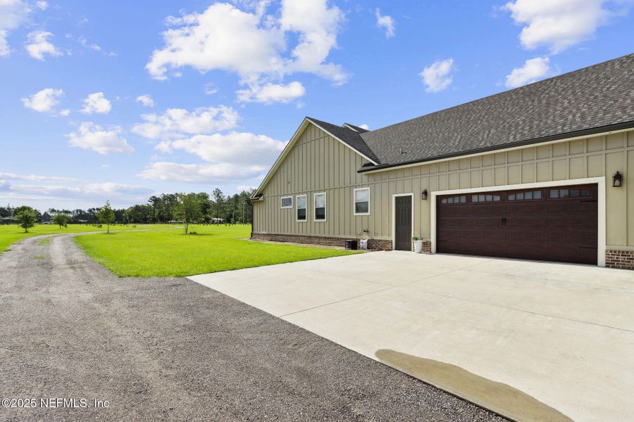 Front exterior of a new home in , Hilliard, FL, highlighting curb appeal (Image 20).