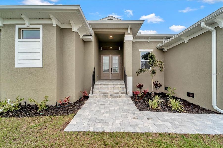 Front exterior of a new home in , Port Charlotte, FL, highlighting curb appeal (Image 19). Front exterior of a new home in , Port Charlotte, FL, highlighting curb appeal (Image 19).