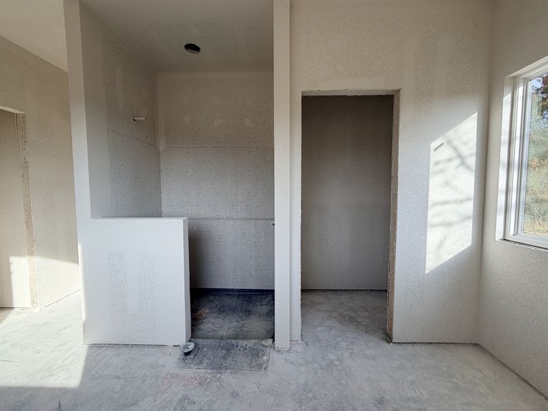 In-progress construction of a new home in Saddle Crest Estates, Weatherford, TX (Image 22).