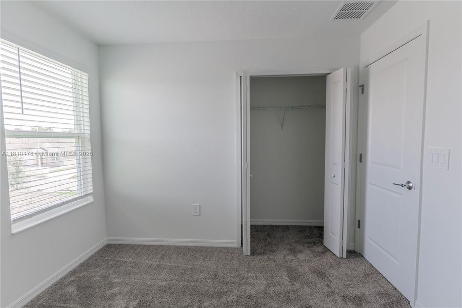 Spacious, unfurnished interior of a new home in Inman Groves, Winter Haven (Image 18). Spacious, unfurnished interior of a new home in Inman Groves, Winter Haven (Image 18).