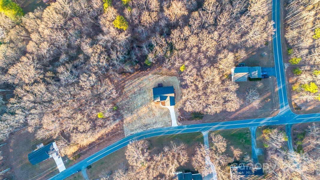 aerial view of home and neighbors