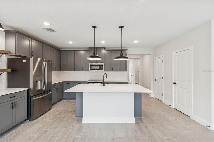 Furnished interior view inside a new home in Aspire at Canter Creek, Davenport (Image 7).