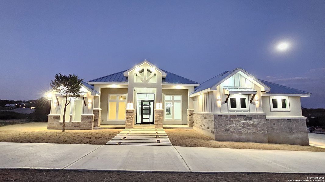 Front exterior of a new home in , New Braunfels, TX, highlighting curb appeal (Image 20).