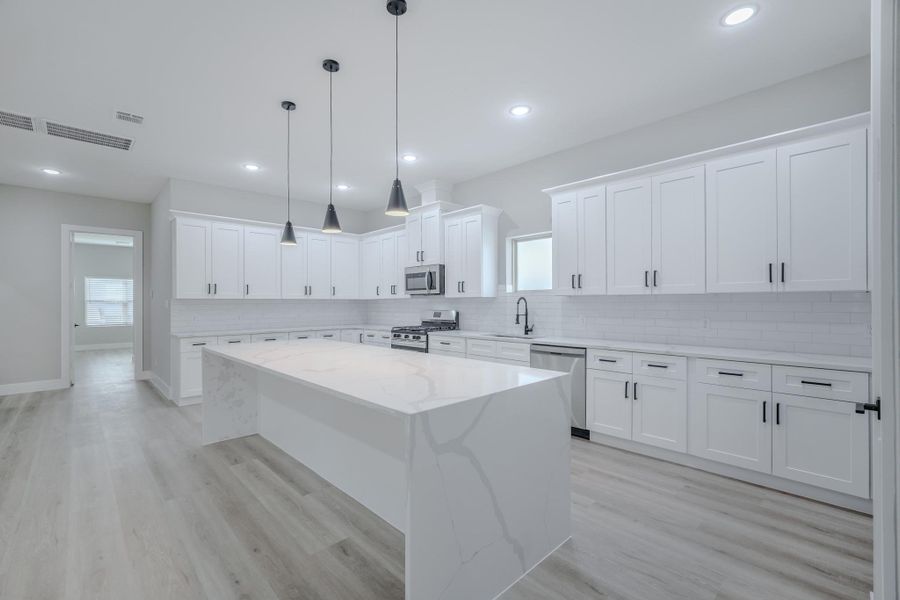 Charming single-story home featuring 3 spacious bedrooms, a fully upgraded kitchen with modern finishes, and a light-filled open layout that invites warmth and comfort into every corner.
