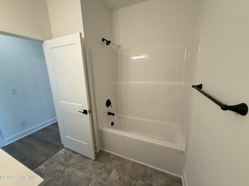 Spacious, unfurnished interior of a new home in Wood Creek Landing, Leland (Image 30).