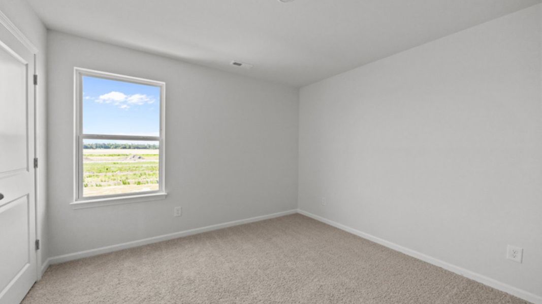 Spacious, unfurnished interior of a new home in Villa Grande, Winterville (Image 33).