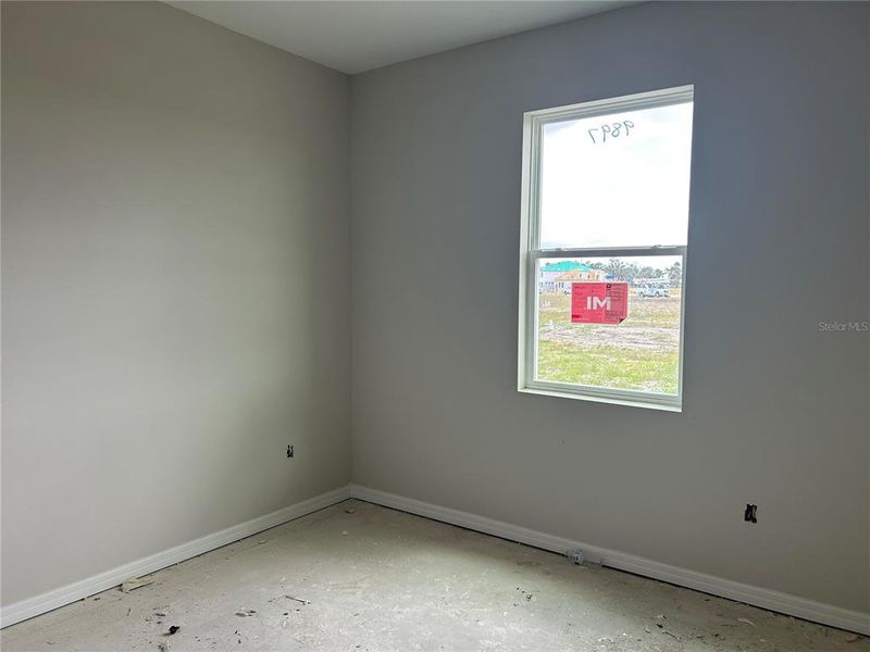 In-progress construction of a new home in Oakfield Trails Signature, Parrish, FL (Image 7).