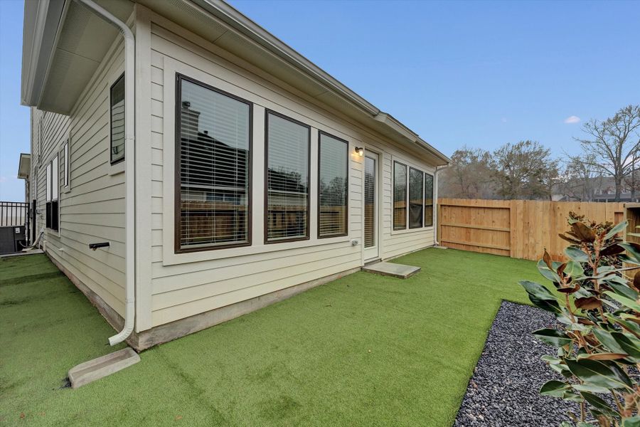 Exterior details and patio area of a home in Summer Place  35', Montgomery (Image 31).