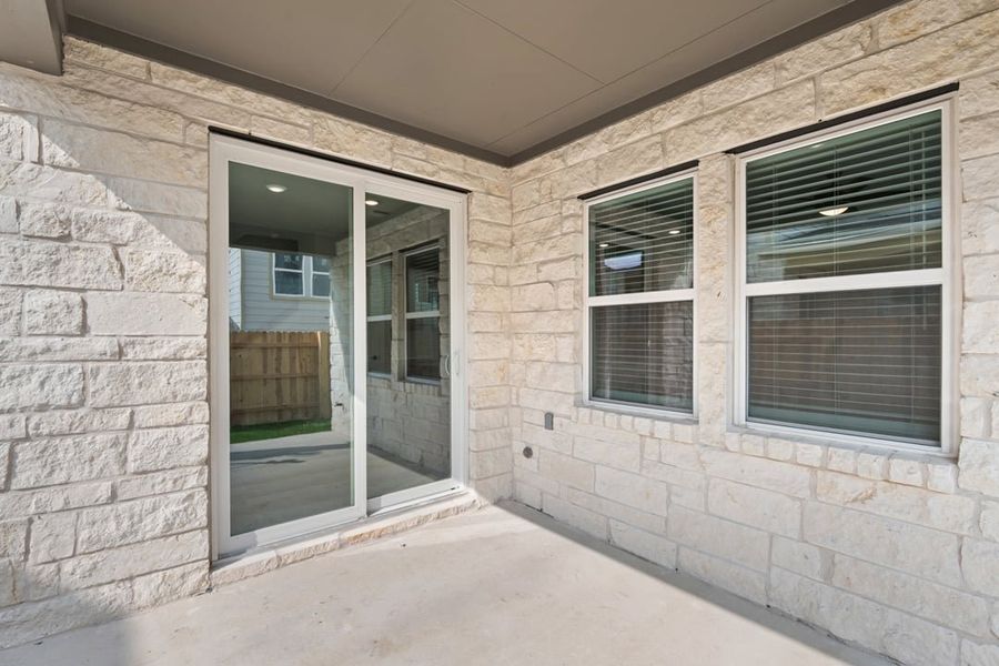 Exterior details and patio area of a home in Union Collection at Park Central, Georgetown (Image 28).
