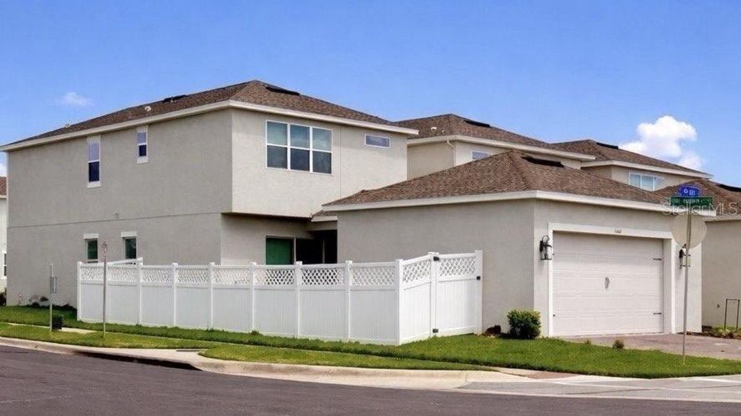 Front exterior of a new home in , Winter Garden, FL, highlighting curb appeal (Image 25).