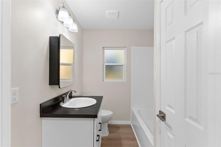 Furnished interior view inside a new home in , Auburndale (Image 9).