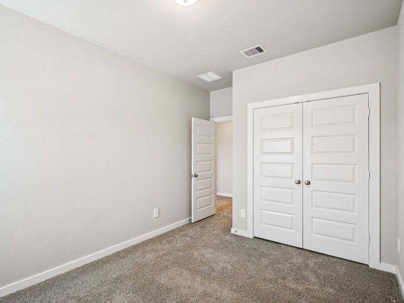 Spacious, unfurnished interior of a new home in Pinewood Trails - City Series, Atascocita (Image 15).