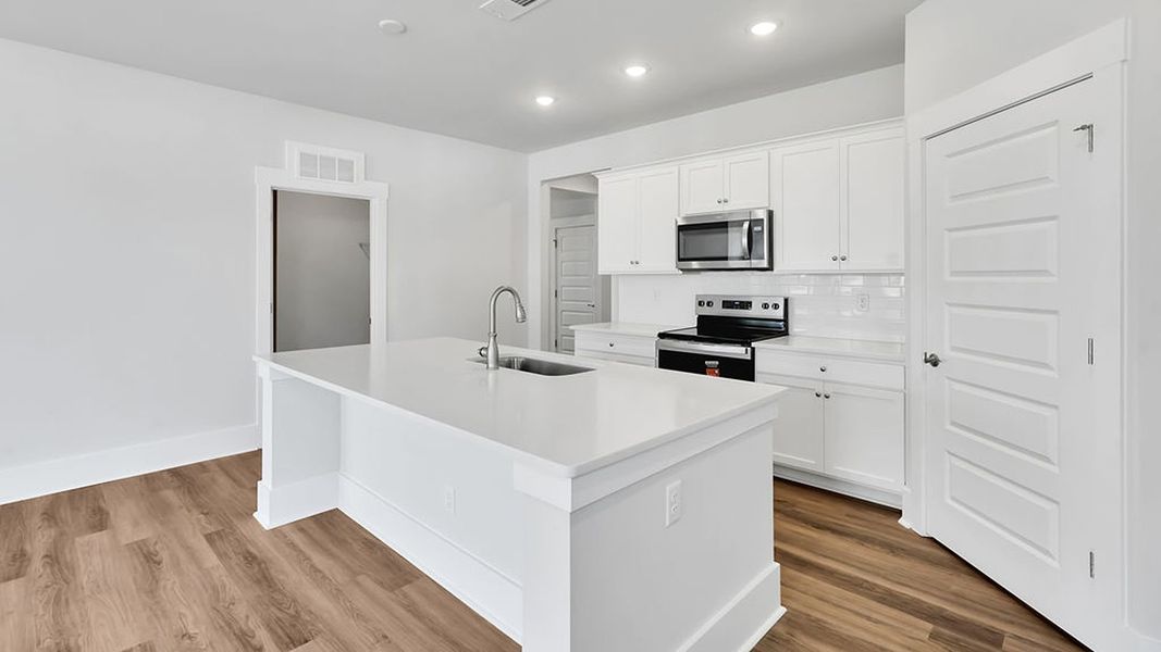 Furnished interior view inside a new home in The Haven at Indigo Preserve, Leland (Image 7).