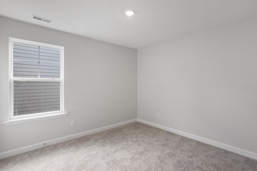 Spacious, unfurnished interior of a new home in Sweetbrier, Durham (Image 33).