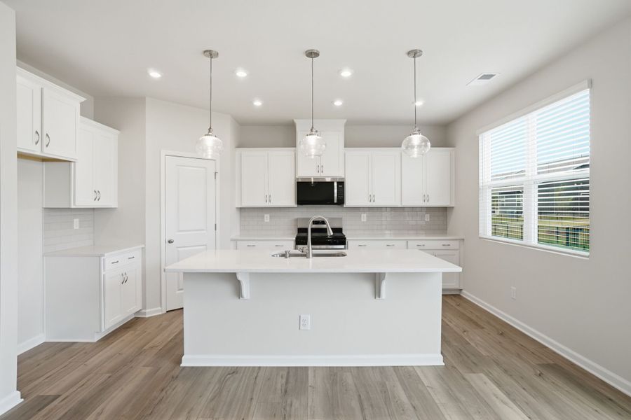 Furnished interior view inside a new home in Waxhaw Landing, Monroe (Image 5).