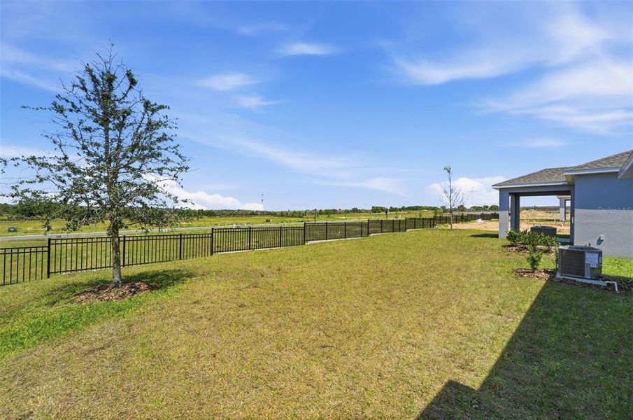 Exterior details and patio area of a home in Hodges Reserve, Howey-in-the-Hills (Image 3).