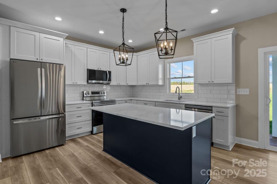 Furnished interior view inside a new home in , Olin (Image 6). Furnished interior view inside a new home in , Olin (Image 6).